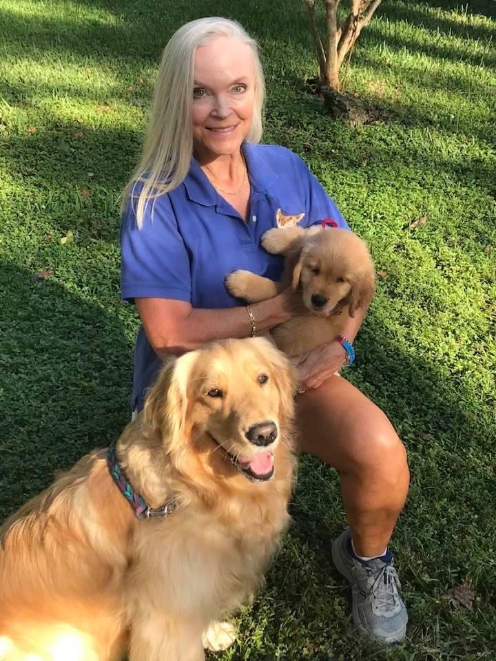 Photo of Jinny and a Golden Retriever Dog